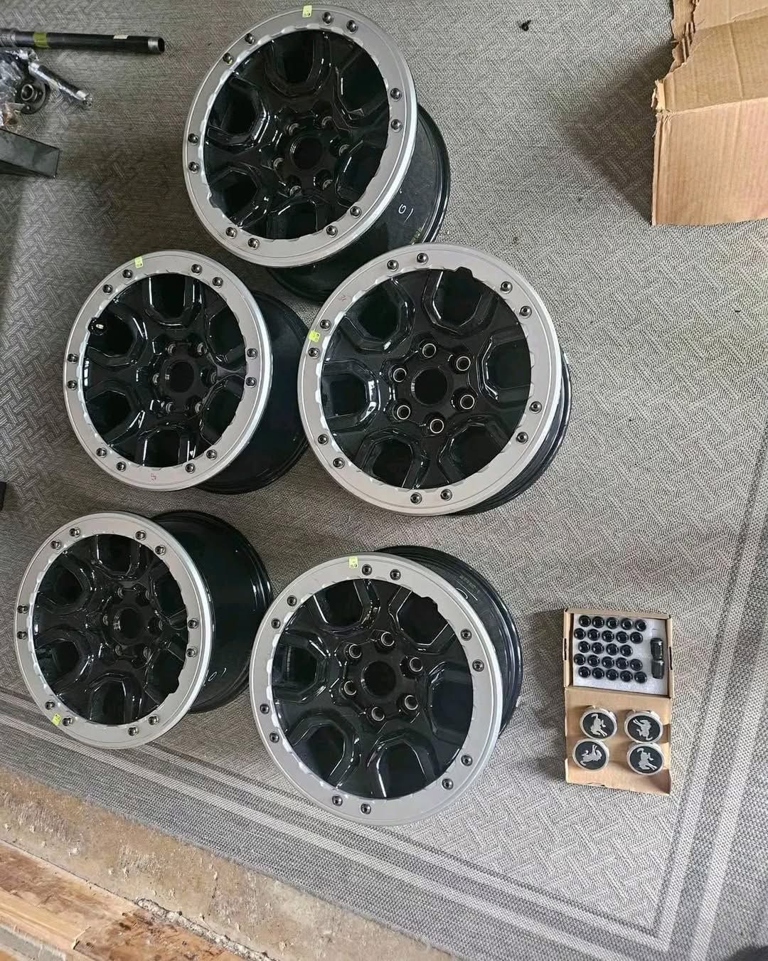 Set of Ford Bronco Sasquatch Wheels, 5 total. They will fit any 2021- 2024 Ford Bronco. They include Center Caps, Lugs nuts, and tire pressure sensors